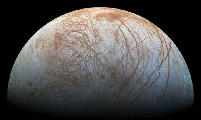 Jupiter`s moon Europa may expel water plumes from under icy shell - Nasa